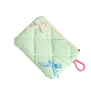 Mint green quilted makeup bag with double bows and a pink wrist strap for women