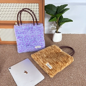 Winter plush leopard print tote bag with soft faux fur and brown leather handles