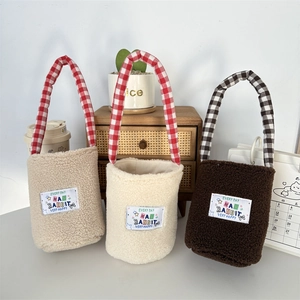 Three plush water bottle bags in cream, oat, and brown with checkered handles