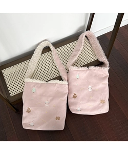 Detailed embroidery of pink plush shoulder bag with cute winter bear and snowman patterns