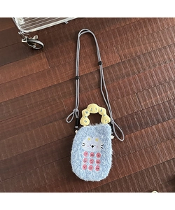 Detail of light blue plush cartoon animal phone bag with yellow pleated handle texture