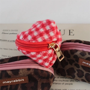 Red houndstooth and leopard print mini cosmetic coin pouches with gold zippers