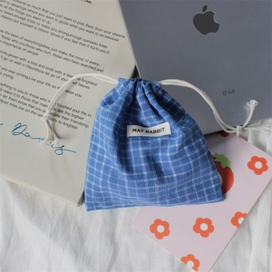 Blue and white plaid drawstring storage bag for cosmetics and small accessories