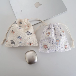 Quilted drawstring storage bags with cute elephant and bear prints for cosmetics and travel