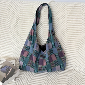 Retro multi-colored plaid canvas tote bag in a relaxed hobo style for casual daily commute