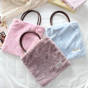 Leopard print plush tote bag in pink, blue and brown with premium leather handles