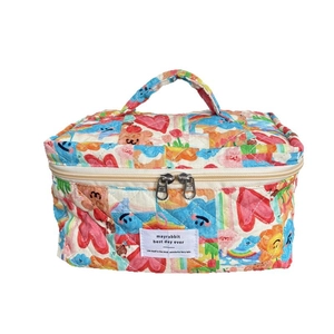 Trousse de maquillage en coton matelassé avec motifs mignons et poignée solide