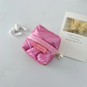 Pink heart quilted storage pouch with pearl charm and zipper for wireless earphones