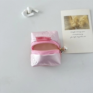 Pink puffy PU earphone case with butterfly embroidery and pearl charm detail