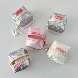Quilted PU waterproof earphone pouches with bow embroidery and pearl charms in various colors