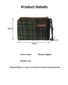 Detail view of plaid fabric coin purse with dimensions 14x10x2cm and metal zipper