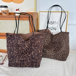 Leopard print faux suede tote bag set with black leather straps for stylish daily commute