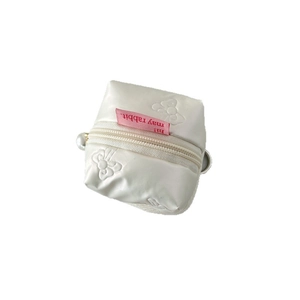 Mini white quilted PU pouch for wireless earphones with pink ribbon and pearl zipper