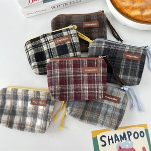 Retro plaid canvas coin purse with zipper and lanyard shown in various color patterns