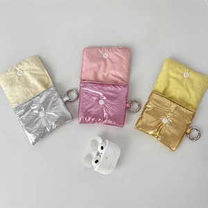 Quilted metallic fabric cases for AirPods with snap closure and snap hooks in three colors