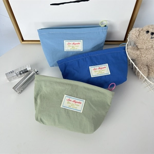 Three-piece macaron-colored mini nylon makeup bags with zip rings in blue and green