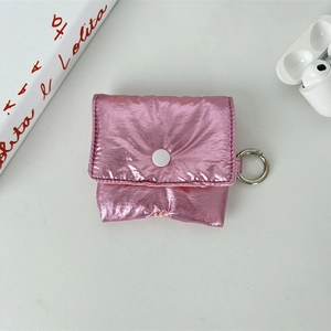 Pink metallic texture earphone case with white snap button and silver carabiner hook