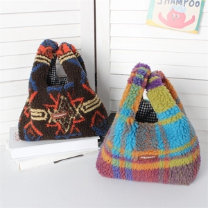 Detail of plush faux fur wrist bags showing geometric patterns and soft teddy fleece texture