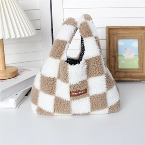 Detail of checkered plush handbag with Mayrabbit leather tag and soft wool-like texture