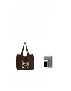 Size comparison of large brown letter print canvas tote bag with tablet and phone