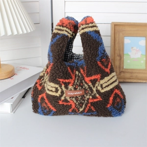 Close-up of plush tote bag with ethnic patterns and black-white checkered lining