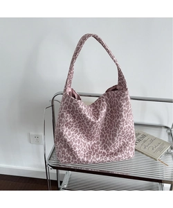 Close-up of leopard print tote bag in dusty rose canvas for office and casual use