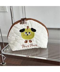 Detail of heart-quilted cosmetic bag with pear embroidery and bear-shaped zippers