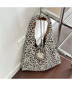 Top view of large leopard print corduroy tote bag showing interior lining and soft texture