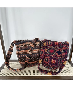 Close-up of bohemian fleece bucket bags with geometric patterns and soft plush texture