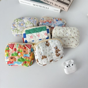 Quilted floral mini pouches in various patterns for coins, jewelry and AirPods storage