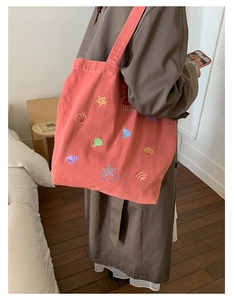 Pink washed denim tote bag with cute sea creature embroidery and large capacity space