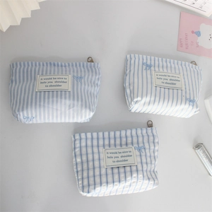 Three-piece embroidered bow cosmetic bag set with blue stripes and plaid cotton fabric