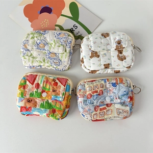 Quilted floral card holders in four cute patterns with snap button and zipper closure
