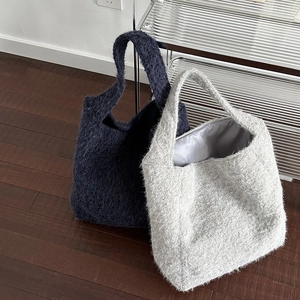 Minimalist wool bucket tote bags in navy blue and light grey for winter fashion