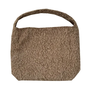 Brown wool bucket bag with large capacity and soft texture for winter commuting