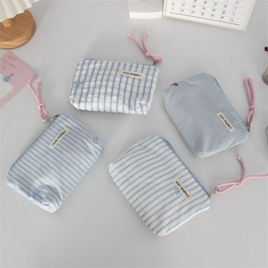 Blue striped and checkered small cotton canvas storage bags with pink cord zippers