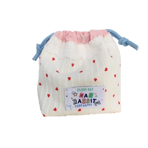 Off-white knit drawstring bag with red heart patterns and delicate lace edge trim