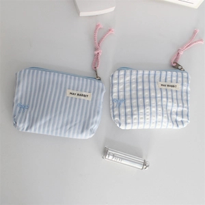 Blue and white striped canvas mini coin purse set with zipper and bow detail