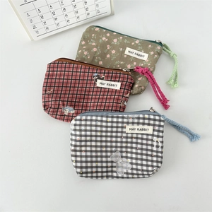 Cute canvas mini storage bags with floral and plaid patterns for lipsticks and earphones