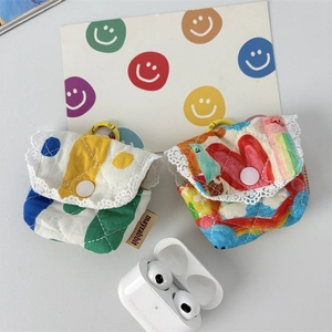Quilted floral earphone case with lace trim and yellow clip for wireless earbuds storage