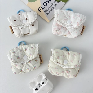 Quilted floral earphone pouches in various patterns with lace trim and blue carabiners