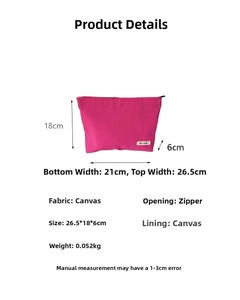 Detail of rose red canvas toiletry bag with zipper and size dimension annotations