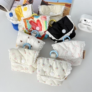 Quilted floral earbud cases with white lace trim, snap buttons, and colorful hooks