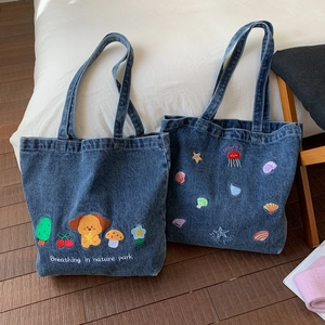 Vintage denim tote bag with cute animal embroidery and spacious shoulder strap design