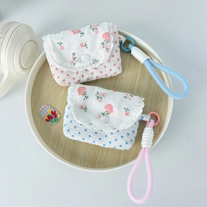 Floral fabric earphone pouch with colorful braided lanyard and lace trim detail