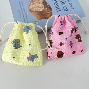 Cute cartoon drawstring storage bags with embossed texture in yellow and pink colors
