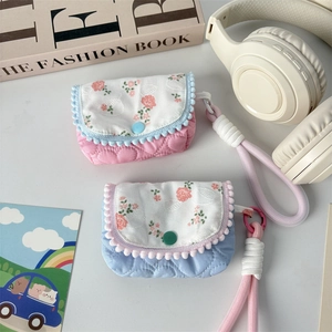 Floral quilted mini pouch set with heart pattern and pom-pom trim in pink and blue