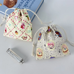 Cute cartoon puffed drawstring bags with bunny and bear prints for travel makeup storage