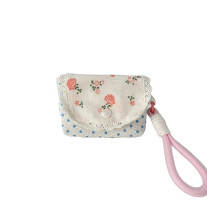 Floral mini storage pouch with lace trim and polka dot pattern for earphones and coins
