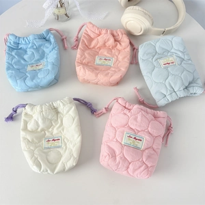Quilted heart-pattern drawstring camera pouches in blue, white, pink and grey colors
